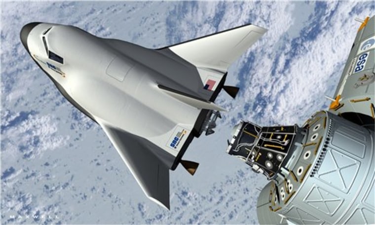 This artist's rendering provided by Sierra Nevada Space Systems shows the company's proposed Dream Chaser spacecraft docking with the International Space Station.